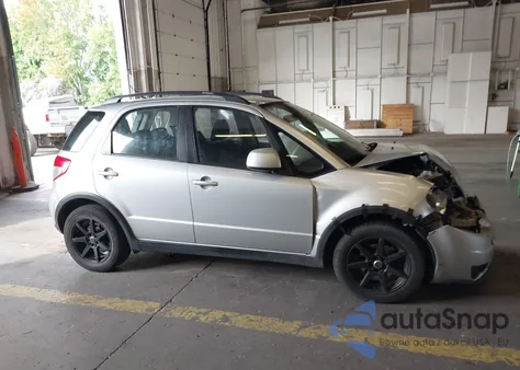 2010 Suzuki Sx4 Technology z USA, uszkodzony, nr VIN JS2YB5A39A6302670